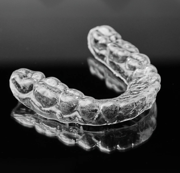 Mouthguard placed against a dark background